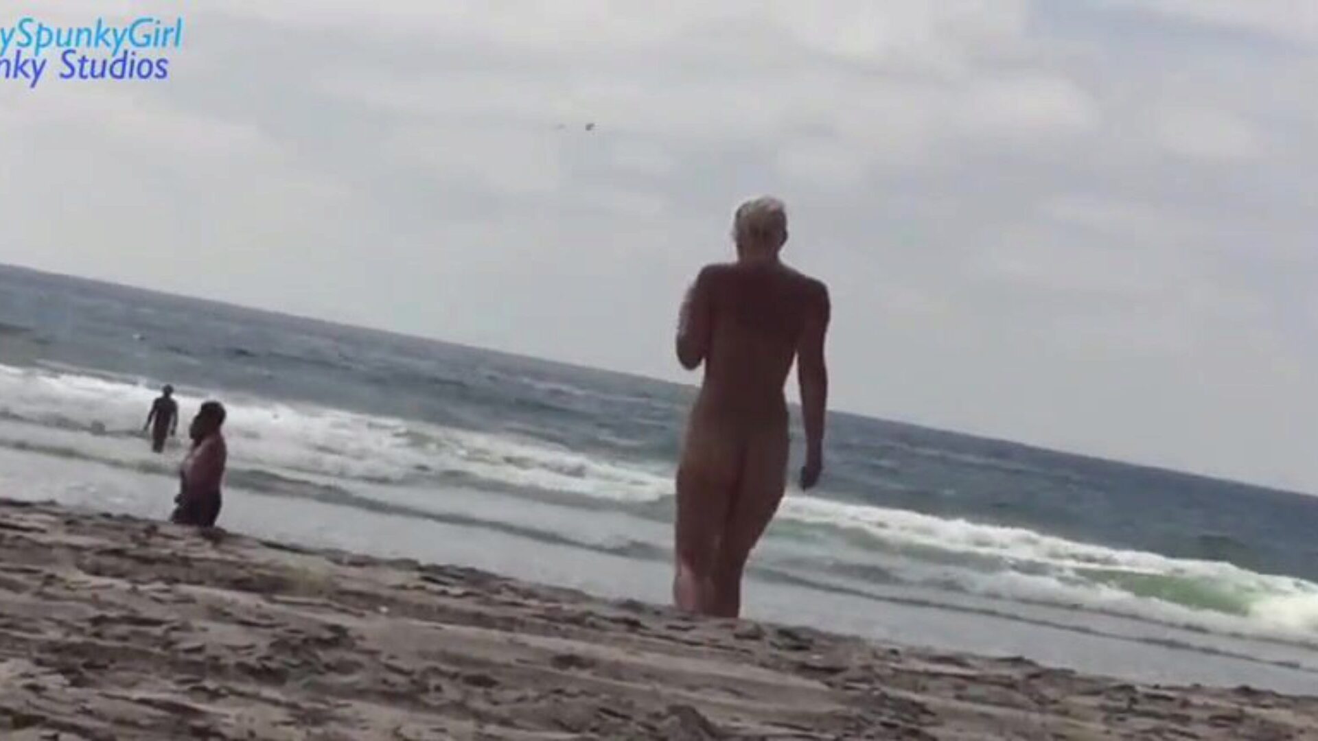 Weenie sucking on the beach